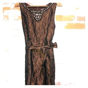 Sleeveless knee length dress with bead trim